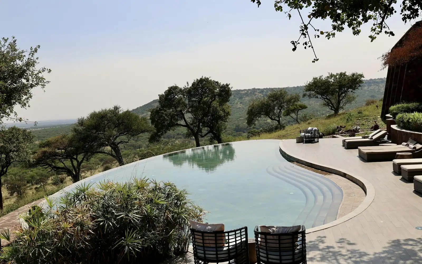 A bushveld lodge pool overlooking the plains